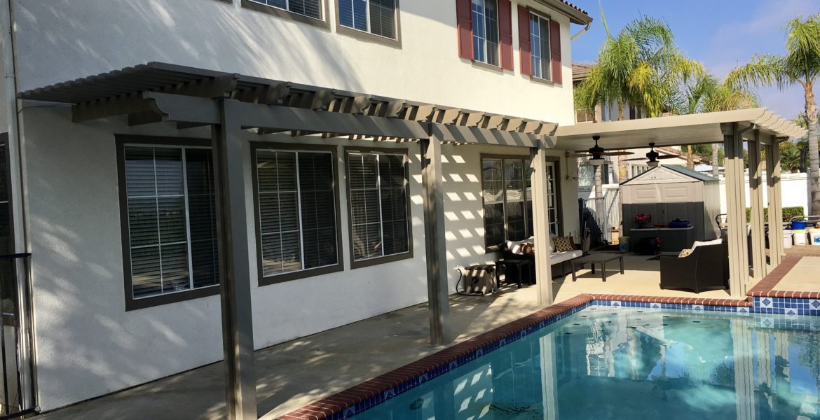 Modern outdoor patio with pool and contemporary aluminum patio cover